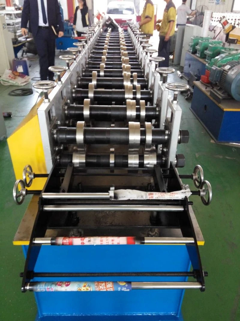 Hot Rolled Coil Metal Roof Panel Roll Forming Machine Steel Profile Roller Shutter Door Gate Frame Shaping Machine